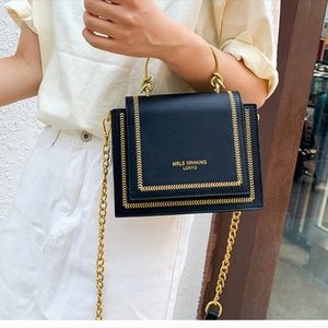 Black and gold purse